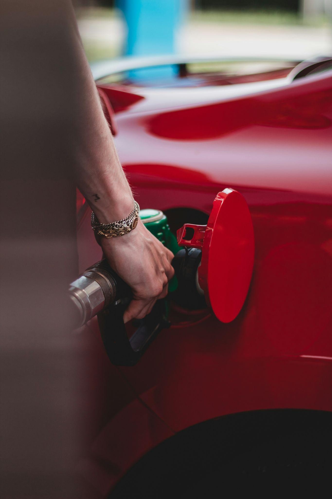 Fuel being pumped into a car
